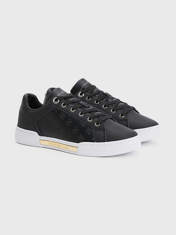 black th monogram embossed trainers for women tommy hilfiger
