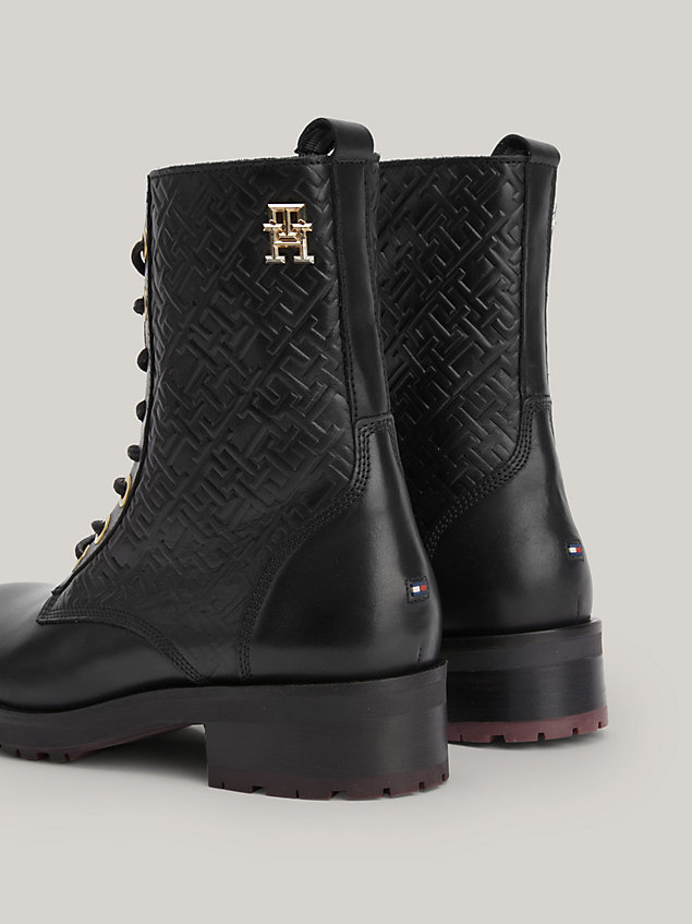 black essential th monogram embossed leather ankle boots for women tommy hilfiger