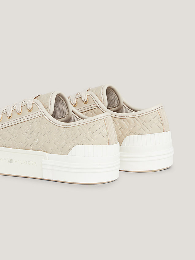 beige th monogram quilted lace-up trainers for women tommy hilfiger
