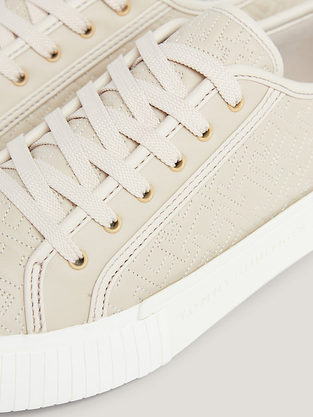 beige th monogram quilted lace-up trainers for women tommy hilfiger