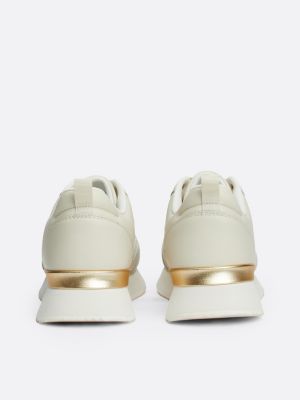 sneakers running in pelle con monogramma th bianco da donne tommy hilfiger