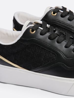 sneakers in pelle con plateau e monogrammi th nero da donne tommy hilfiger