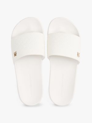 white embossed th monogram pool slides for women tommy hilfiger