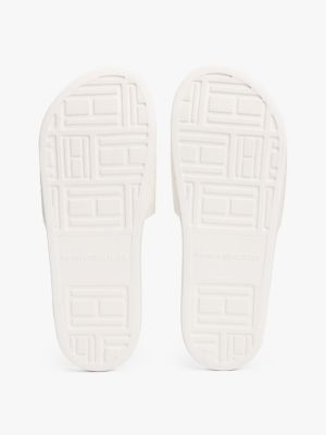 white embossed th monogram pool slides for women tommy hilfiger