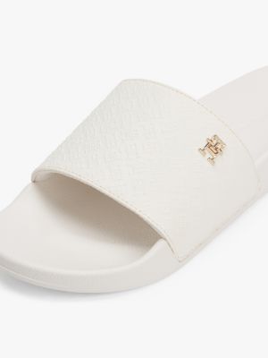 white embossed th monogram pool slides for women tommy hilfiger