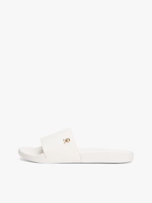 white embossed th monogram pool slides for women tommy hilfiger