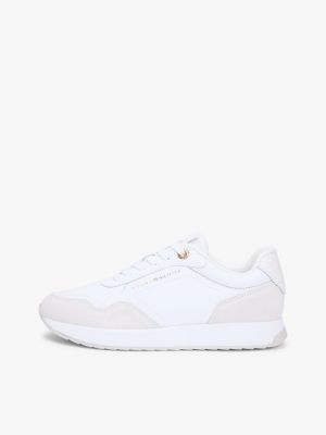 white embossed th monogram leather trainers for women tommy hilfiger