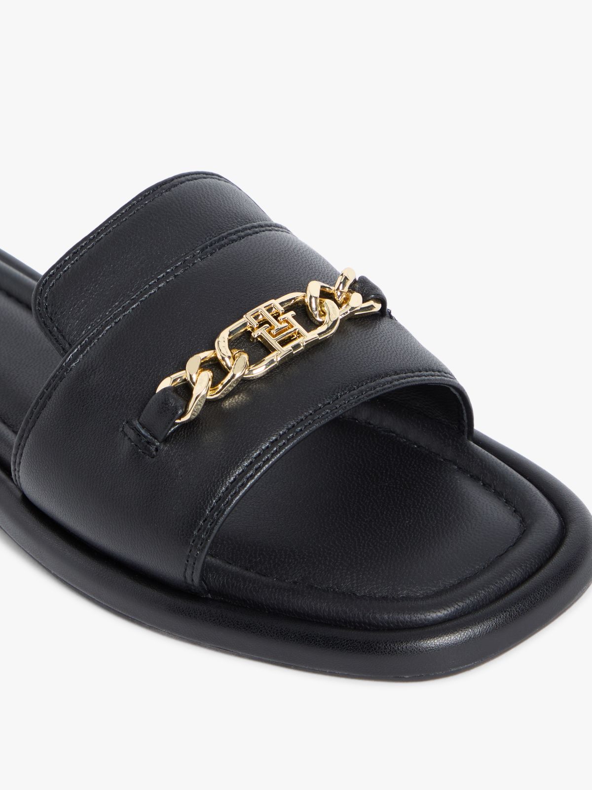 TH Monogram Horsebit Flat Leather Mules — Black