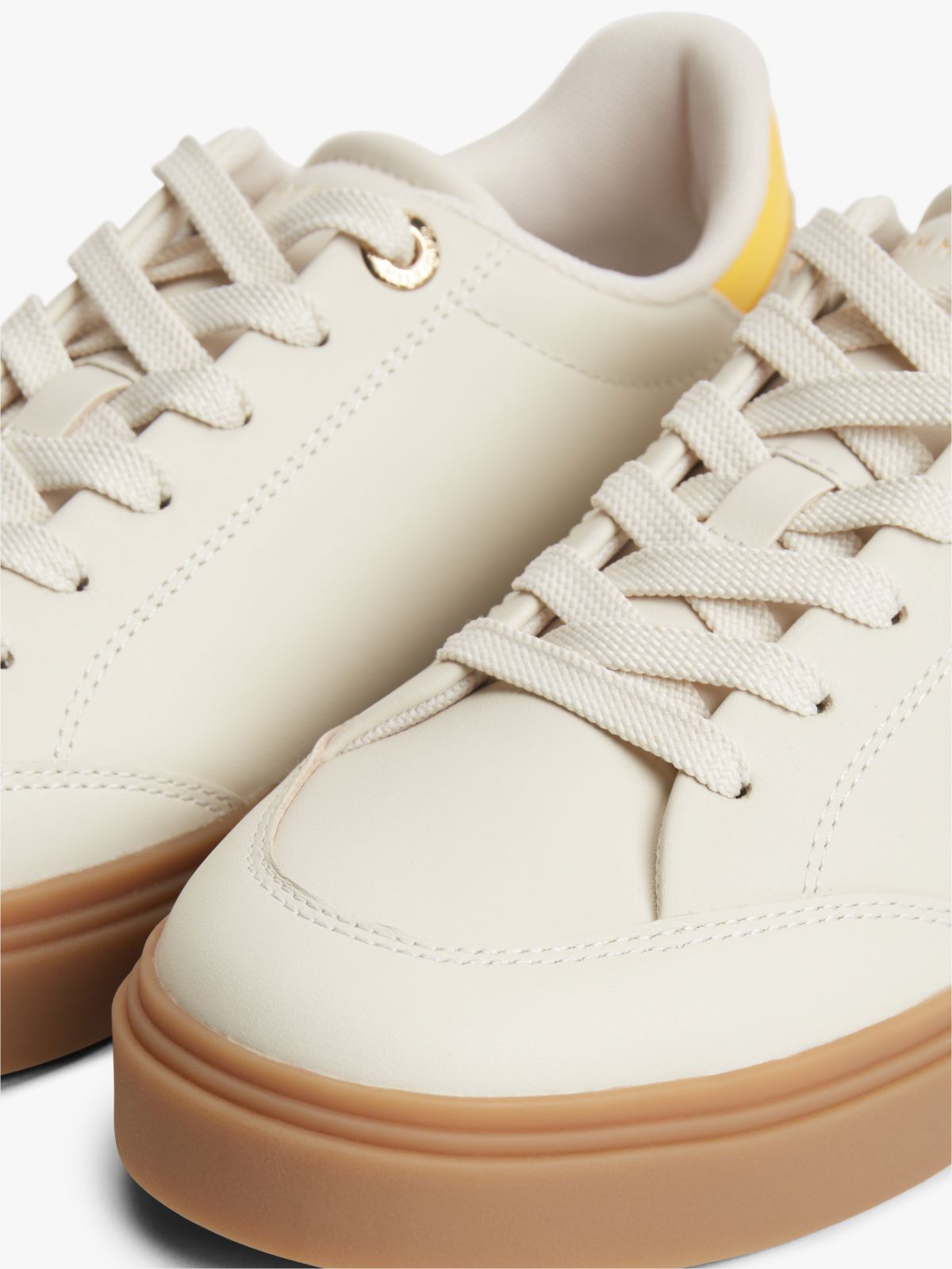TH Monogram Leather Trainers — Beige