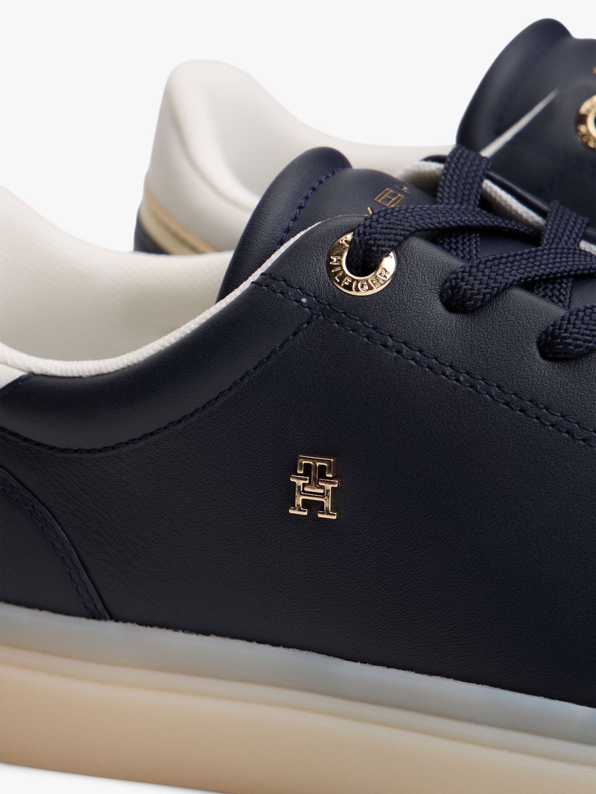 TH Monogram Leather Trainers — Blue