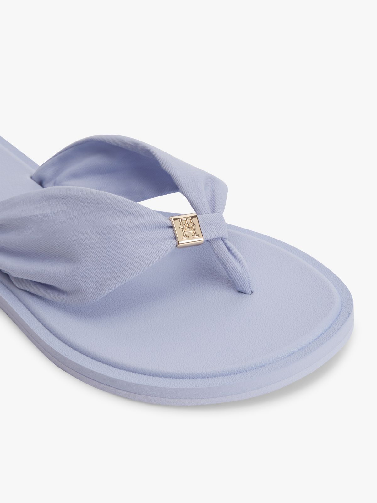 TH Monogram Plaque Flip-Flops — Purple