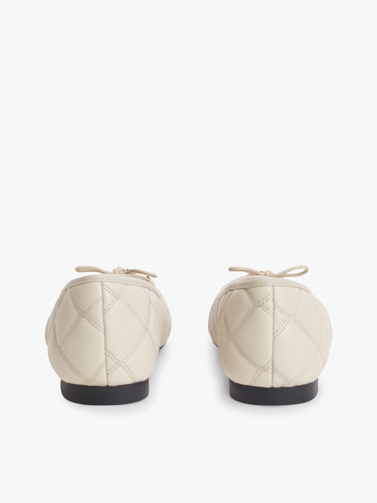 Logo Charm Quilted Leather Ballerinas — Beige