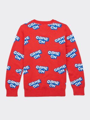 red slogan jumper