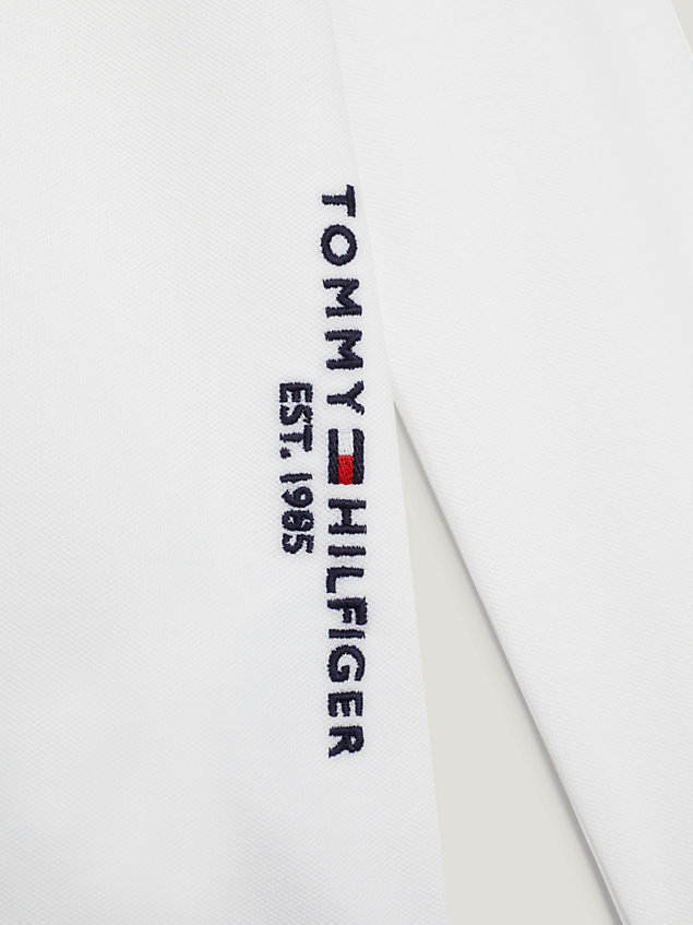 white essential long sleeve regular fit polo for boys tommy hilfiger