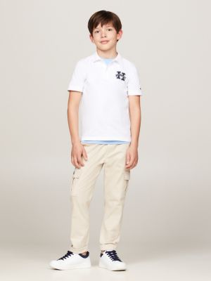 white regular fit varsity letter polo for boys tommy hilfiger