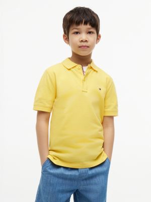 polo coupe standard essential à drapeau brodé yellow pour garçons tommy hilfiger