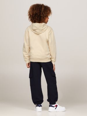 felpa varsity con cappuccio e logo ricamato beige da bambini tommy hilfiger