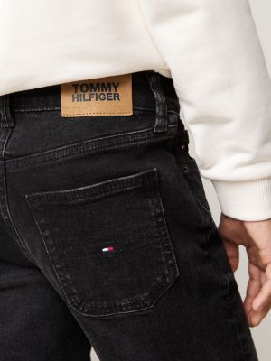 vaqueros rectos negros con efecto desteñido negro de niños tommy hilfiger