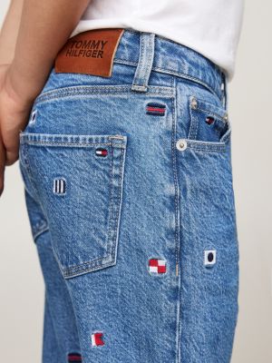 jeans affusolati sbiaditi con bandierine ricamate blu da bambini tommy hilfiger