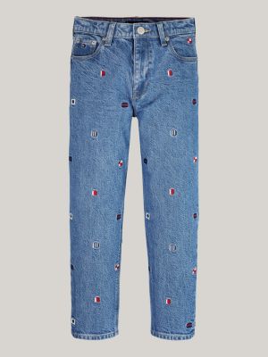 jeans affusolati sbiaditi con bandierine ricamate blu da bambini tommy hilfiger