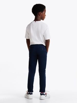 chino slim 1985 collection en sergé bleu pour garçons tommy hilfiger