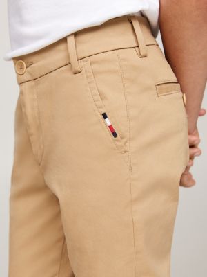 beżowy chinosy 1985 collection o wąskim kroju dla chłopcy - tommy hilfiger
