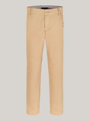 beżowy chinosy 1985 collection o wąskim kroju dla chłopcy - tommy hilfiger