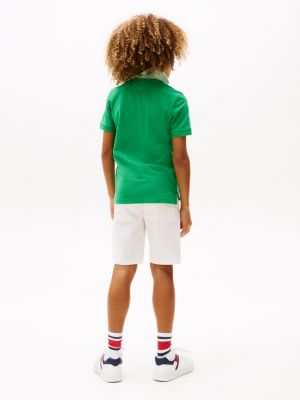 polo con logo ricamato verde da bambini tommy hilfiger