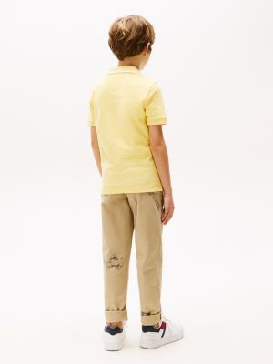 polo con logo ricamato giallo da bambini tommy hilfiger