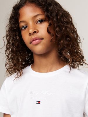 t-shirt con logo metallizzato bianco da bambine tommy hilfiger