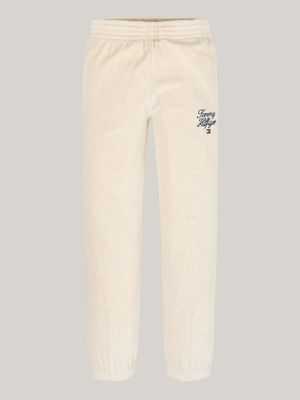 joggers de velour con bajos elásticos beige de niñas tommy hilfiger