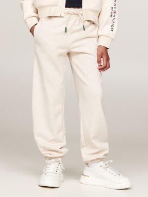 beige varsity curved logo relaxed joggers for girls tommy hilfiger