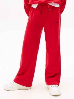 joggers larghi con logo ricamato rosso da bambine tommy hilfiger