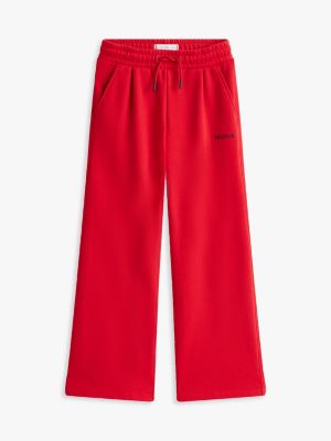 joggers larghi con logo ricamato rosso da bambine tommy hilfiger