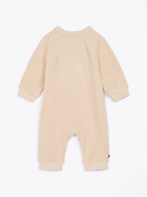 grenouillère hilfiger monotype manches longues beige pour nouveau-né tommy hilfiger