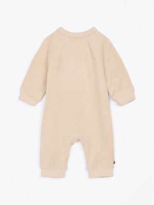 beige hilfiger monotype long sleeve coverall for newborn tommy hilfiger