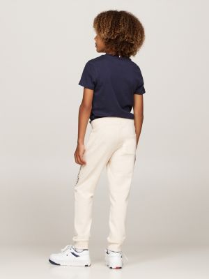 beige jogginghose mit logo, tunnelzug und bündchen für gender-inclusive kinder - tommy hilfiger