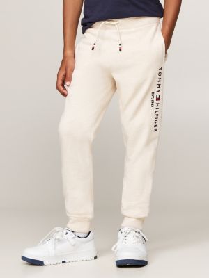 beige jogginghose mit logo, tunnelzug und bündchen für gender-inclusive kinder - tommy hilfiger