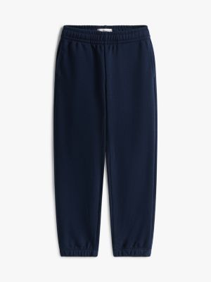 niebieski joggery z wyhaftowaną flagą dla unisex dla dzieci - tommy hilfiger