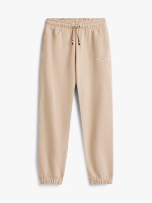 beige logo-jogginghose aus gebürstetem fleece für gender-inclusive kinder - tommy hilfiger