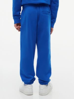 blau heritage terry-jogginghose mit flag-logo für gender-inclusive kinder - tommy hilfiger