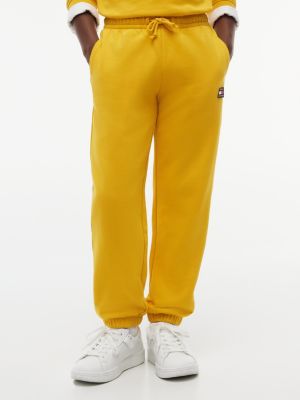 yellow jogginghose mit bündchen und flag-logo-patch für gender-inclusive kinder - tommy hilfiger