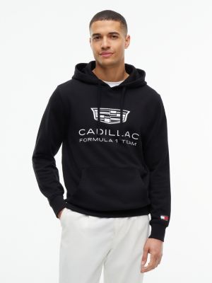 black th x cadillac formula 1® team shield logo hoody for adults gender inclusive tommy hilfiger