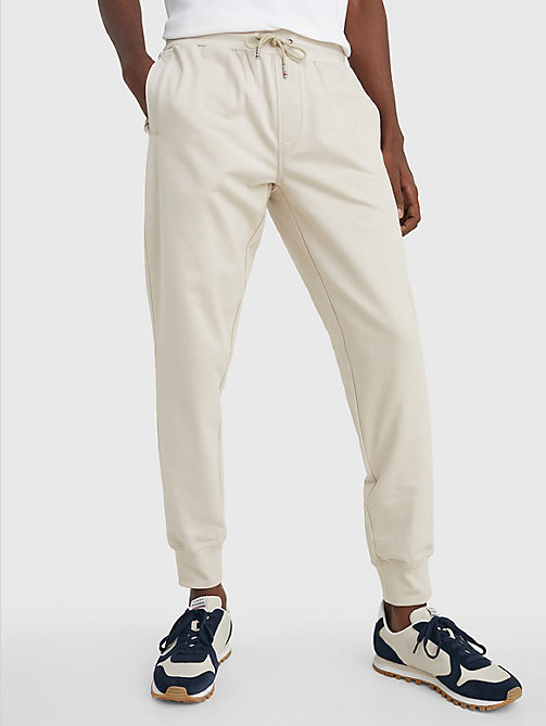 beige 1985 collection stretch joggers for men tommy hilfiger
