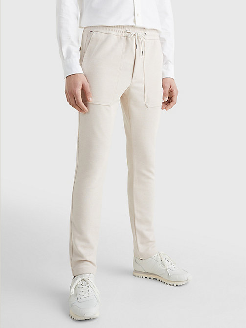 beige bleecker slim fit utility trousers for men tommy hilfiger