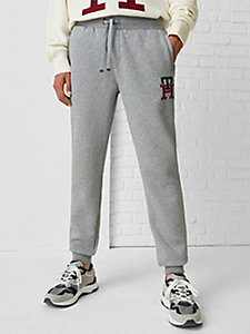 yellow th monogram embroidery joggers for men tommy hilfiger