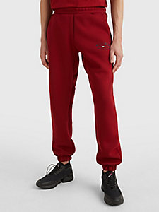 czerwony spodnie dresowe z graficznym nadrukiem dla mężczyźni - tommy hilfiger