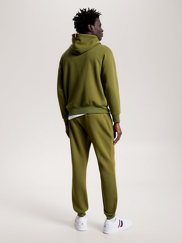 green hoodie met tape-detail en geborduurd monogram voor heren - tommy hilfiger