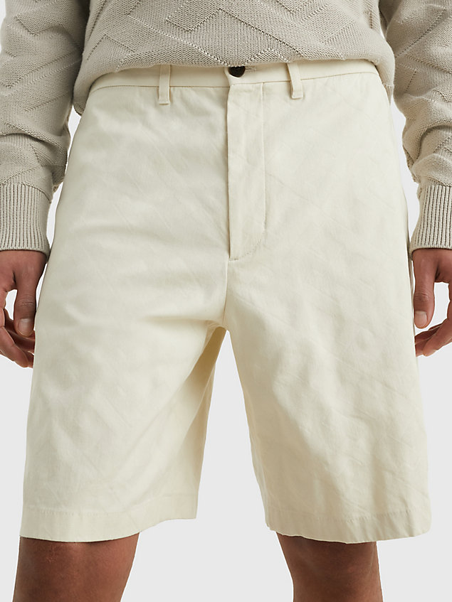 beige th monogram wide leg bermuda shorts for men tommy hilfiger
