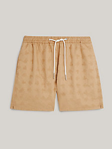 beige disney x tommy monogram chino shorts for men tommy hilfiger